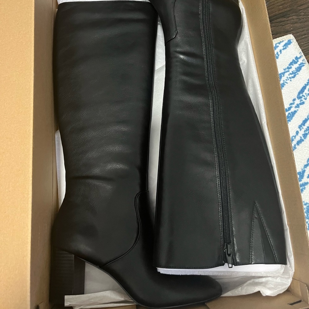 Black tall heeled boots
